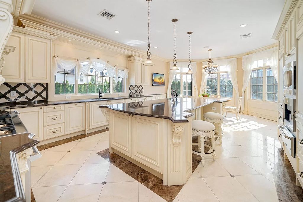 The Home in New Jersey is a luxurious home set on meticulously manicured grounds now available for sale. This home located at 2 Euclid Rd, Fort Lee, New Jersey; offering 06 bedrooms and 07 bathrooms with 6,000 square feet of living spaces. 