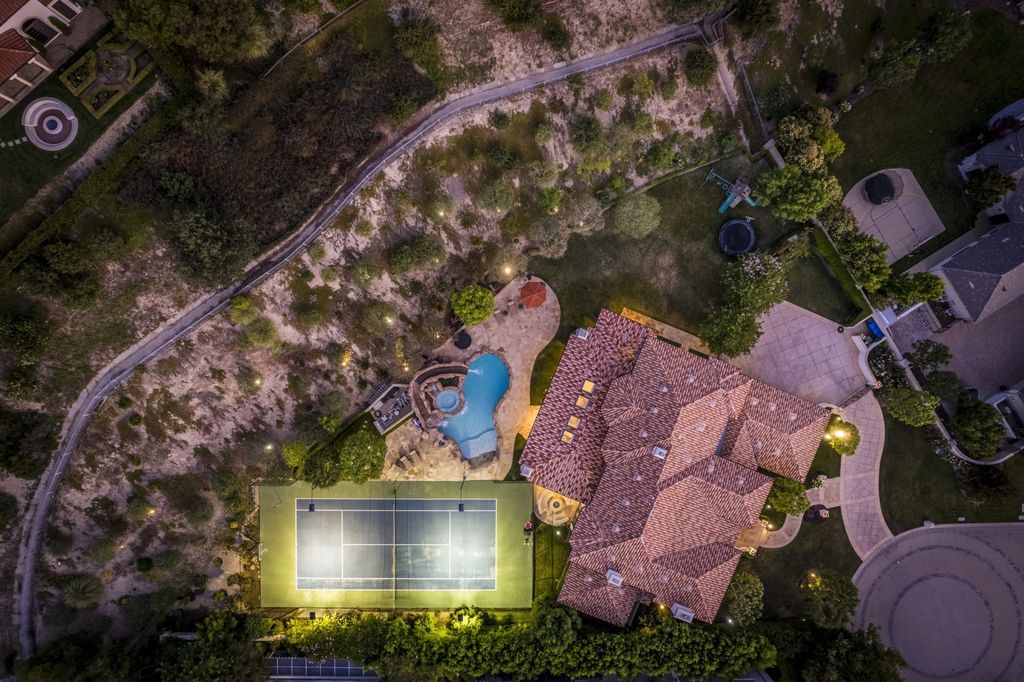 The Villa in Calabasas is a Mediterranean estate sited within the coveted gated community of The Estates of The Oaks now available for sale. This home located at 25232 Prado Del Misterio, Calabasas, California