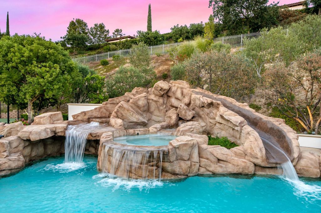 The Villa in Calabasas is a Mediterranean estate sited within the coveted gated community of The Estates of The Oaks now available for sale. This home located at 25232 Prado Del Misterio, Calabasas, California