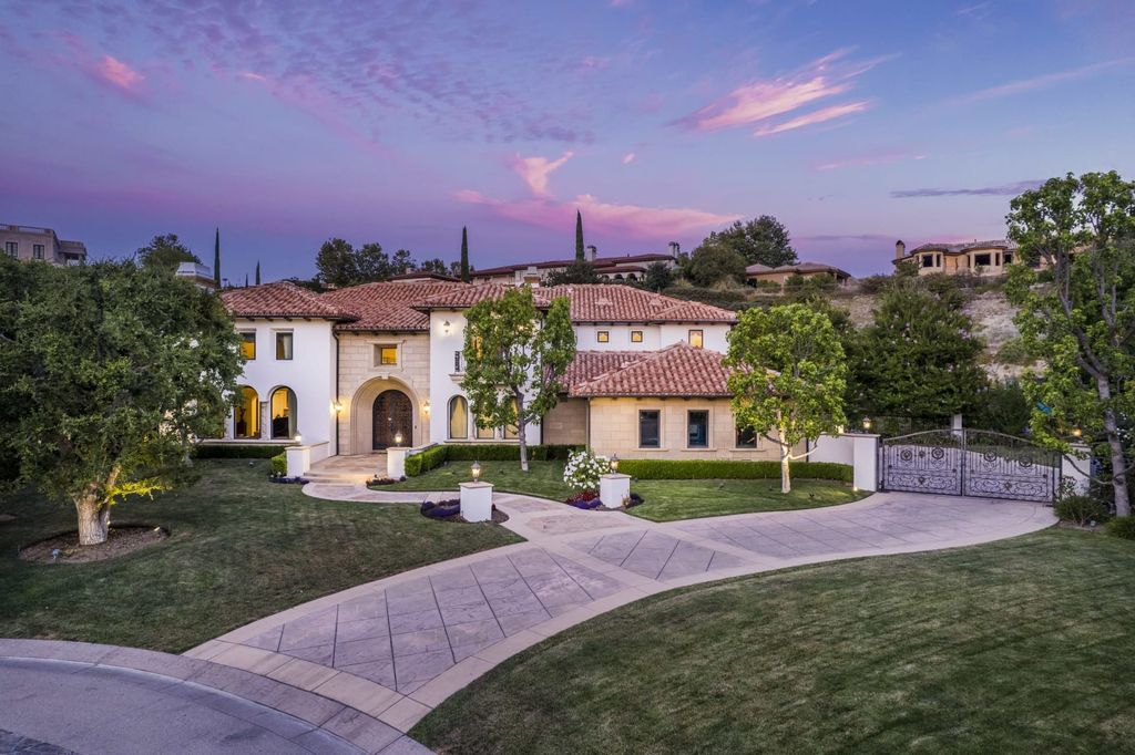 The Villa in Calabasas is a Mediterranean estate sited within the coveted gated community of The Estates of The Oaks now available for sale. This home located at 25232 Prado Del Misterio, Calabasas, California