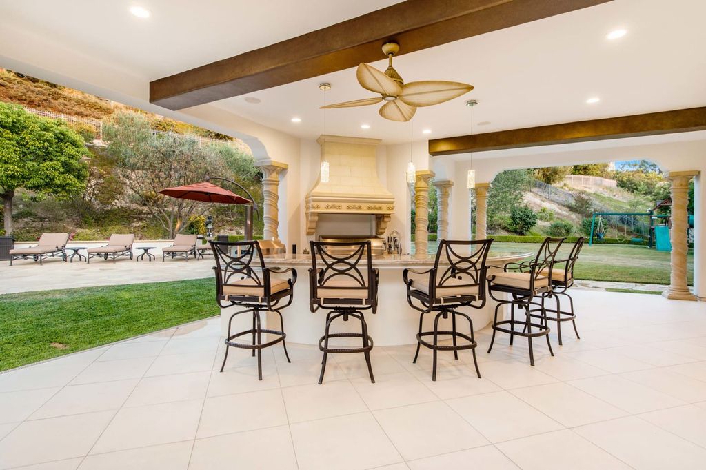 The Villa in Calabasas is a Mediterranean estate sited within the coveted gated community of The Estates of The Oaks now available for sale. This home located at 25232 Prado Del Misterio, Calabasas, California