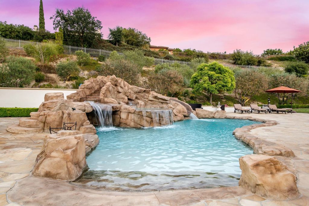 The Villa in Calabasas is a Mediterranean estate sited within the coveted gated community of The Estates of The Oaks now available for sale. This home located at 25232 Prado Del Misterio, Calabasas, California