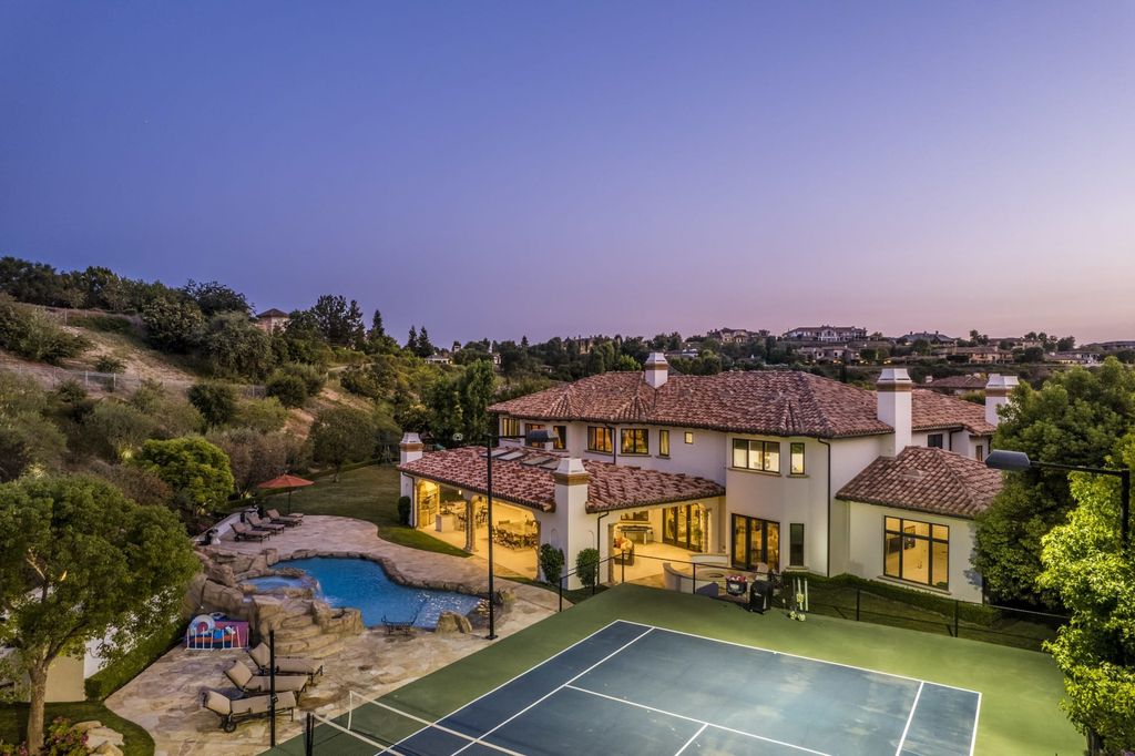 The Villa in Calabasas is a Mediterranean estate sited within the coveted gated community of The Estates of The Oaks now available for sale. This home located at 25232 Prado Del Misterio, Calabasas, California
