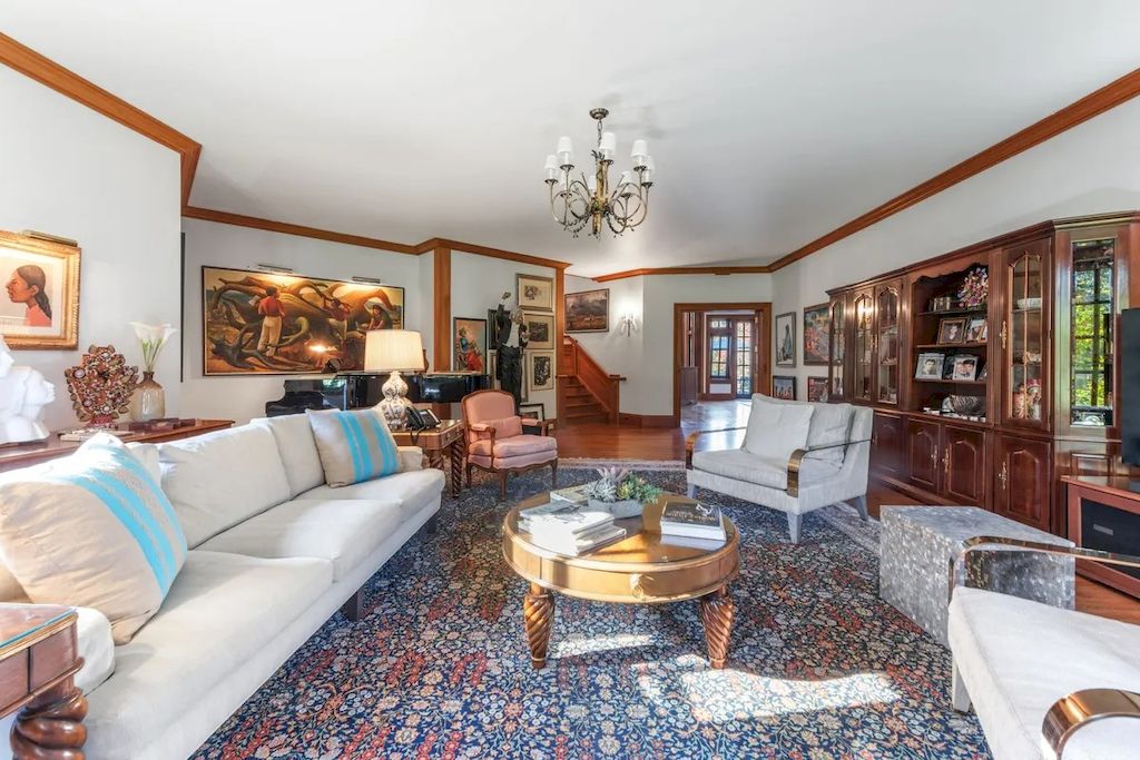 The Home in Connecticut is a luxurious home offering custom designed interiors, enchanting water views, expansive gardens, and so on now available for sale. This home located at 913 Oenoke Rdg, New Canaan, Connecticut; offering 07 bedrooms and 09 bathrooms with 10,824 square feet of living spaces.