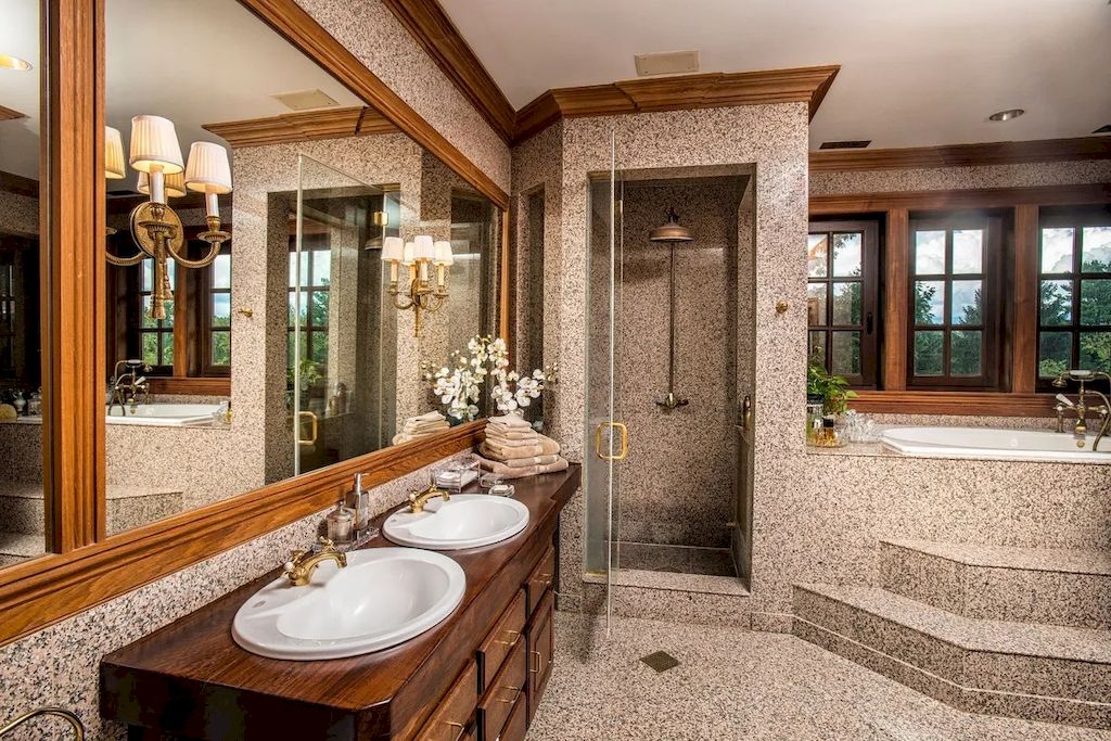 The Home in Connecticut is a luxurious home offering custom designed interiors, enchanting water views, expansive gardens, and so on now available for sale. This home located at 913 Oenoke Rdg, New Canaan, Connecticut; offering 07 bedrooms and 09 bathrooms with 10,824 square feet of living spaces.