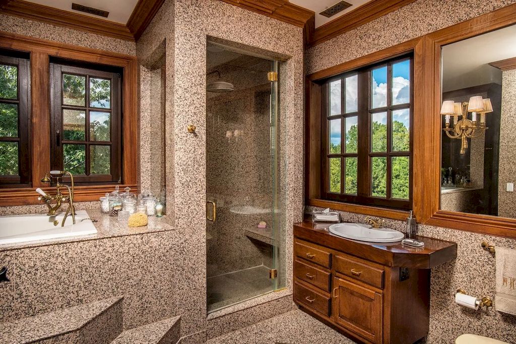 The Home in Connecticut is a luxurious home offering custom designed interiors, enchanting water views, expansive gardens, and so on now available for sale. This home located at 913 Oenoke Rdg, New Canaan, Connecticut; offering 07 bedrooms and 09 bathrooms with 10,824 square feet of living spaces.