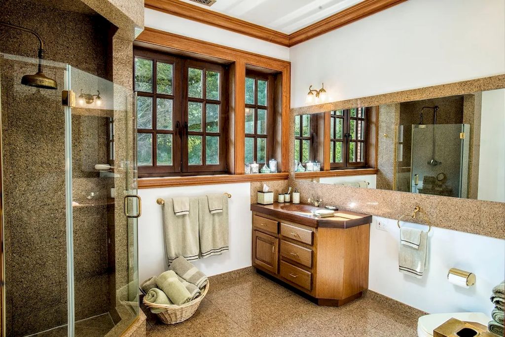 The Home in Connecticut is a luxurious home offering custom designed interiors, enchanting water views, expansive gardens, and so on now available for sale. This home located at 913 Oenoke Rdg, New Canaan, Connecticut; offering 07 bedrooms and 09 bathrooms with 10,824 square feet of living spaces.