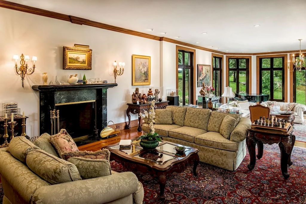 The Home in Connecticut is a luxurious home offering custom designed interiors, enchanting water views, expansive gardens, and so on now available for sale. This home located at 913 Oenoke Rdg, New Canaan, Connecticut; offering 07 bedrooms and 09 bathrooms with 10,824 square feet of living spaces.