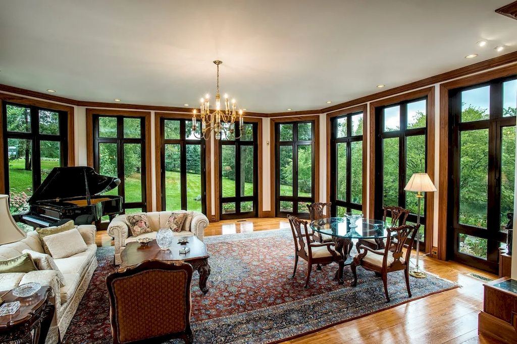 The Home in Connecticut is a luxurious home offering custom designed interiors, enchanting water views, expansive gardens, and so on now available for sale. This home located at 913 Oenoke Rdg, New Canaan, Connecticut; offering 07 bedrooms and 09 bathrooms with 10,824 square feet of living spaces.