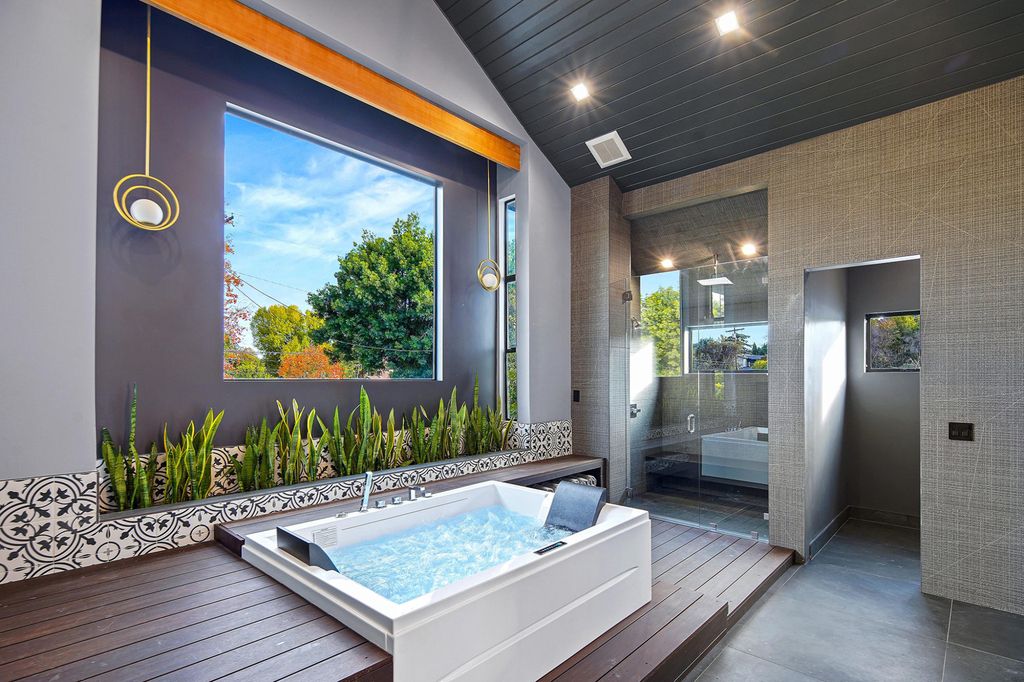 The Home in Encino is a luxurious contemporary estate designed by Alon Zakoot and located in highly coveted Amestoy Estates now available for sale. This home located at 5415 Amestoy Ave, Encino, California