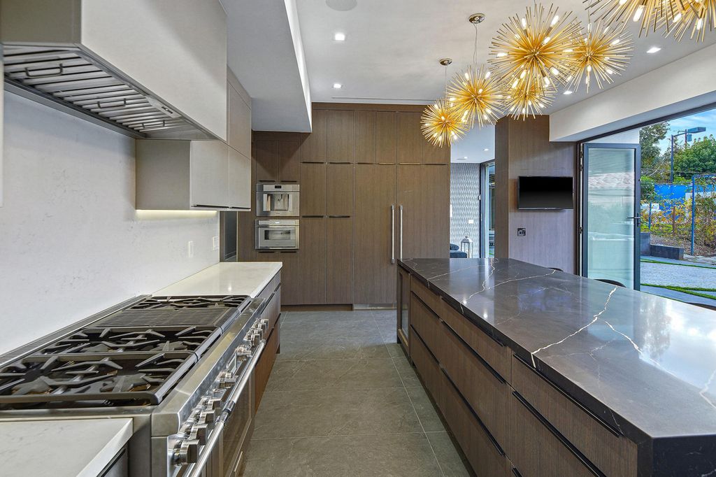 The Home in Encino is a luxurious contemporary estate designed by Alon Zakoot and located in highly coveted Amestoy Estates now available for sale. This home located at 5415 Amestoy Ave, Encino, California