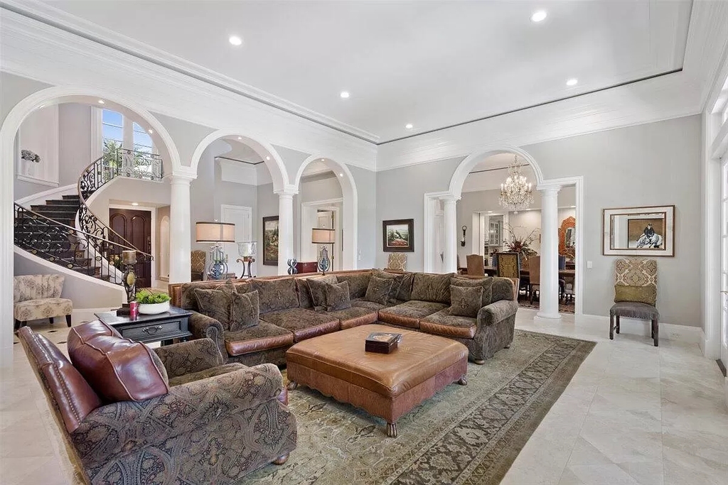 The Home in Wellington is an absolutely stunning estate with volume ceilings and beautiful marble floors throughout now available for sale. This home located at 2968 Hurlingham Dr, Wellington, Florida