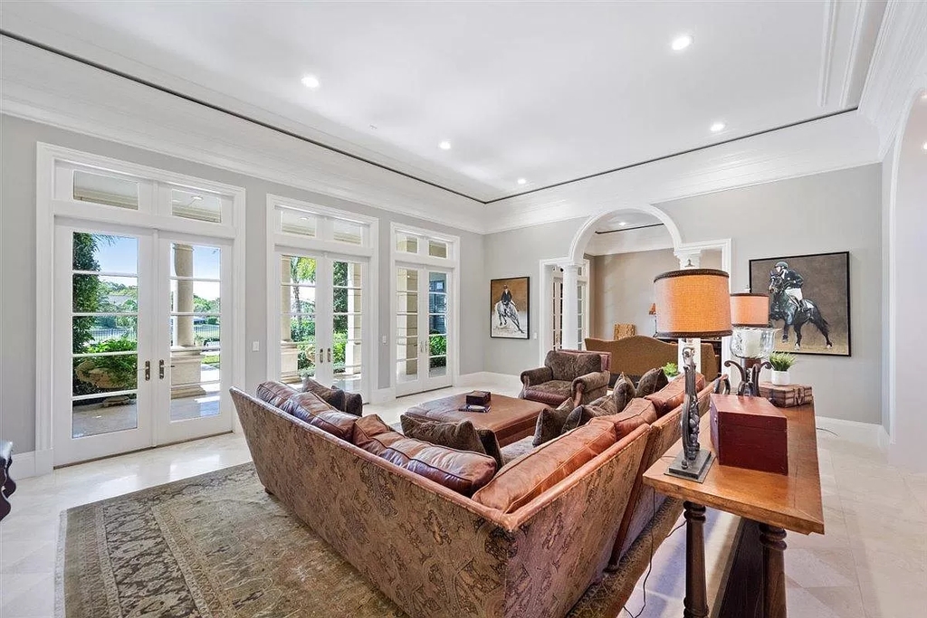 The Home in Wellington is an absolutely stunning estate with volume ceilings and beautiful marble floors throughout now available for sale. This home located at 2968 Hurlingham Dr, Wellington, Florida