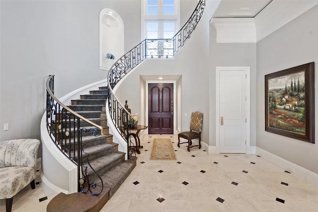 The Home in Wellington is an absolutely stunning estate with volume ceilings and beautiful marble floors throughout now available for sale. This home located at 2968 Hurlingham Dr, Wellington, Florida