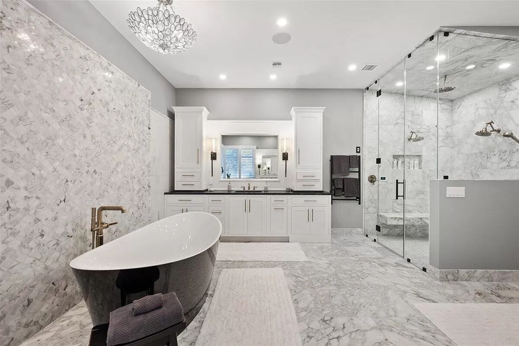 The Home in Wellington is an absolutely stunning estate with volume ceilings and beautiful marble floors throughout now available for sale. This home located at 2968 Hurlingham Dr, Wellington, Florida