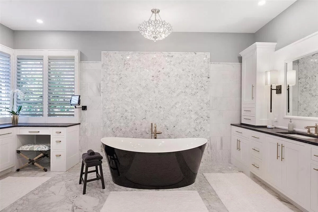 The Home in Wellington is an absolutely stunning estate with volume ceilings and beautiful marble floors throughout now available for sale. This home located at 2968 Hurlingham Dr, Wellington, Florida