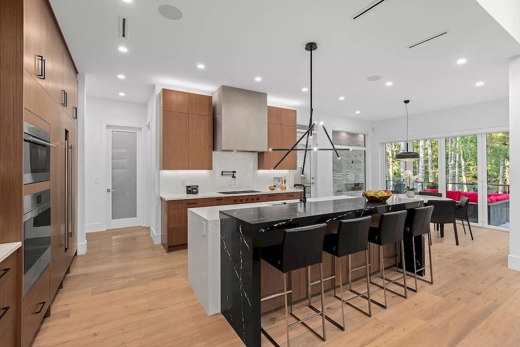 The House in South Surrey is an architectural masterpiece crafted to perfection by Monolith Design Build now available for sale. This home located at 14358 Greencrest Dr, Surrey, BC V4P 1M1, Canada