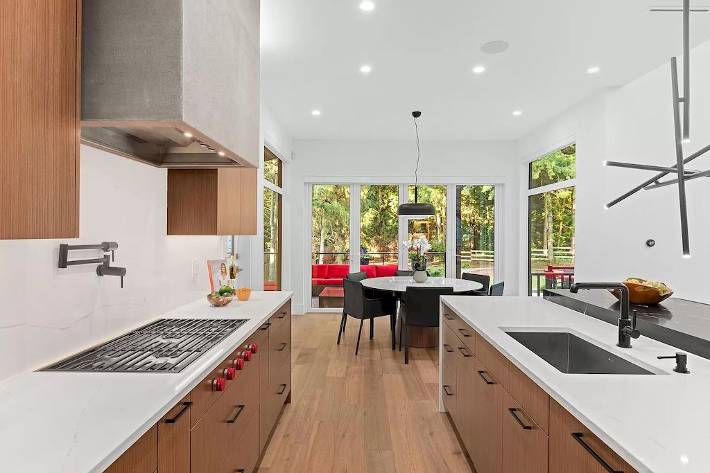 The House in South Surrey is an architectural masterpiece crafted to perfection by Monolith Design Build now available for sale. This home located at 14358 Greencrest Dr, Surrey, BC V4P 1M1, Canada