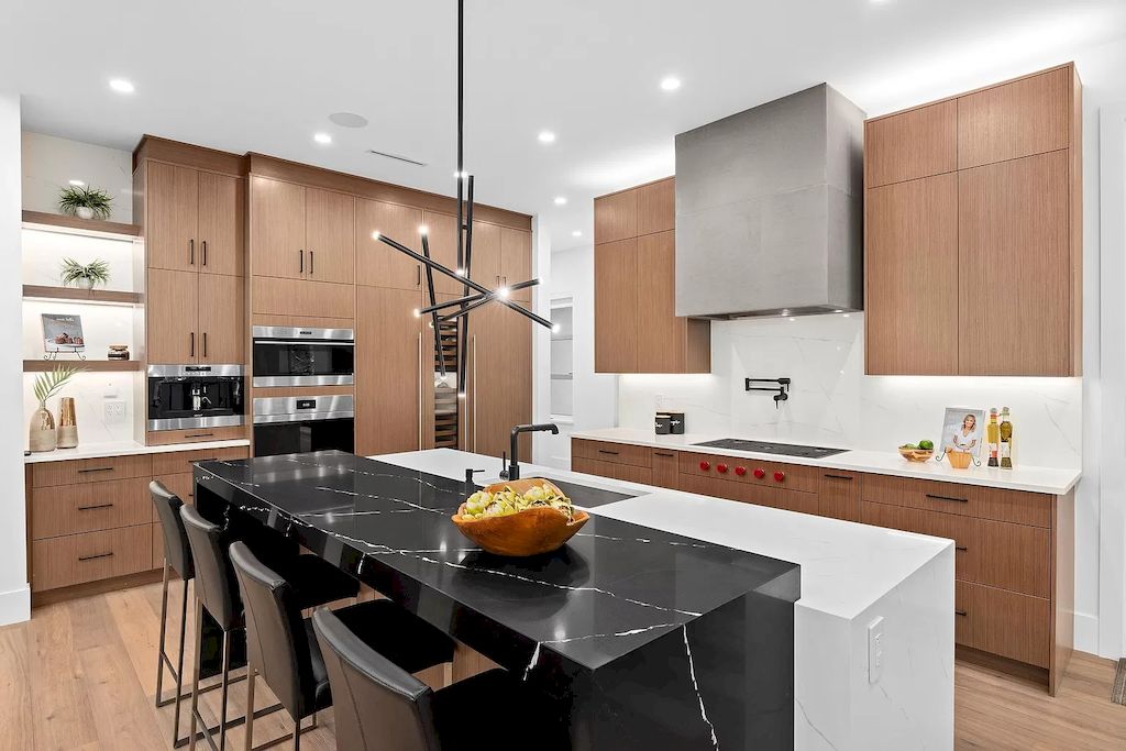 The House in South Surrey is an architectural masterpiece crafted to perfection by Monolith Design Build now available for sale. This home located at 14358 Greencrest Dr, Surrey, BC V4P 1M1, Canada