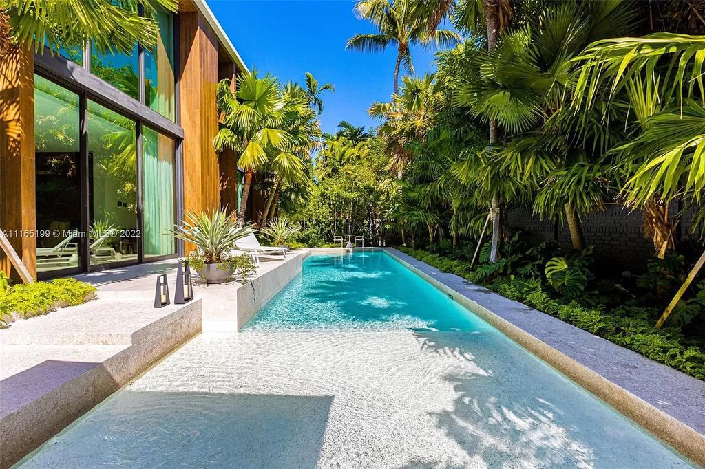 The Villa in Miami Beach is an award winning new construction modern tropical estate on Sunset Island 2 now available for sale. This home located at 2535 Shelter Ave, Miami Beach, Florida
