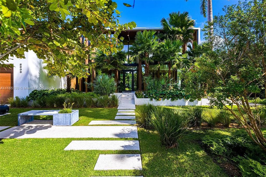 The Villa in Miami Beach is an award winning new construction modern tropical estate on Sunset Island 2 now available for sale. This home located at 2535 Shelter Ave, Miami Beach, Florida