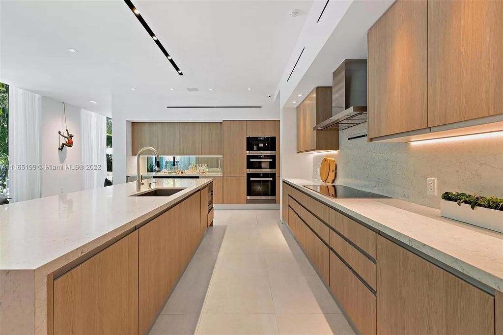 The Villa in Miami Beach is an award winning new construction modern tropical estate on Sunset Island 2 now available for sale. This home located at 2535 Shelter Ave, Miami Beach, Florida