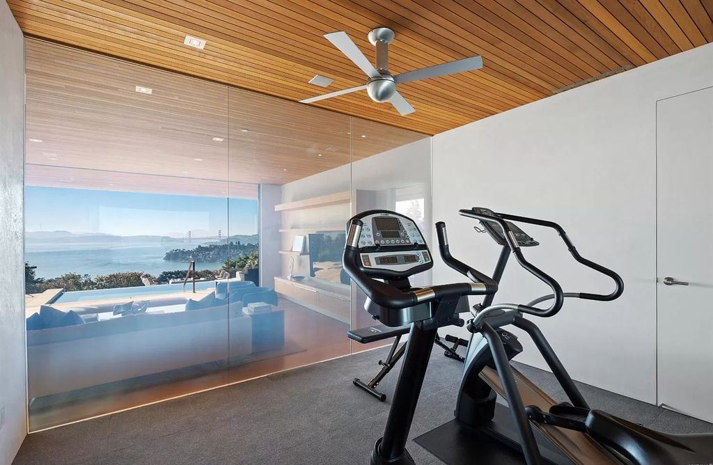 The Home in Tiburon an icon of modern design nestled in the hills above downtown Tiburon, boasts the finest views in the Bay Area now available for sale. This home located at 1860 Mountain View Dr, Belvedere Tiburon, California