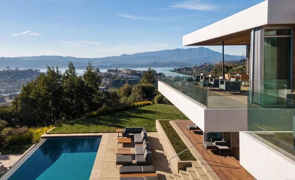 The Home in Tiburon an icon of modern design nestled in the hills above downtown Tiburon, boasts the finest views in the Bay Area now available for sale. This home located at 1860 Mountain View Dr, Belvedere Tiburon, California