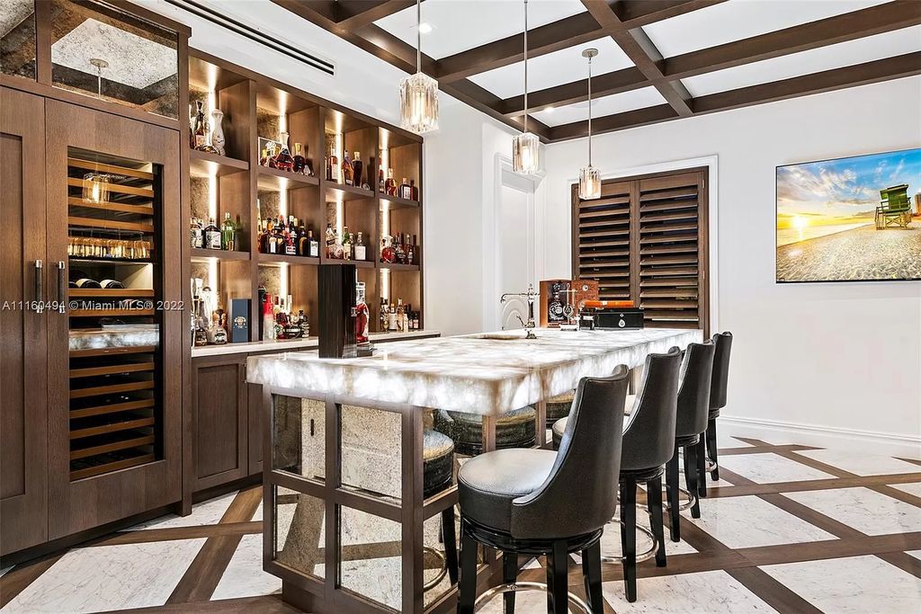 The Mansion in Fort Lauderdale is a timelessly designed home featuring a grand double height entryway and a thoughtful floorplan now available for sale. This home located at 2436 Aqua Vista Blvd, Fort Lauderdale, Florida