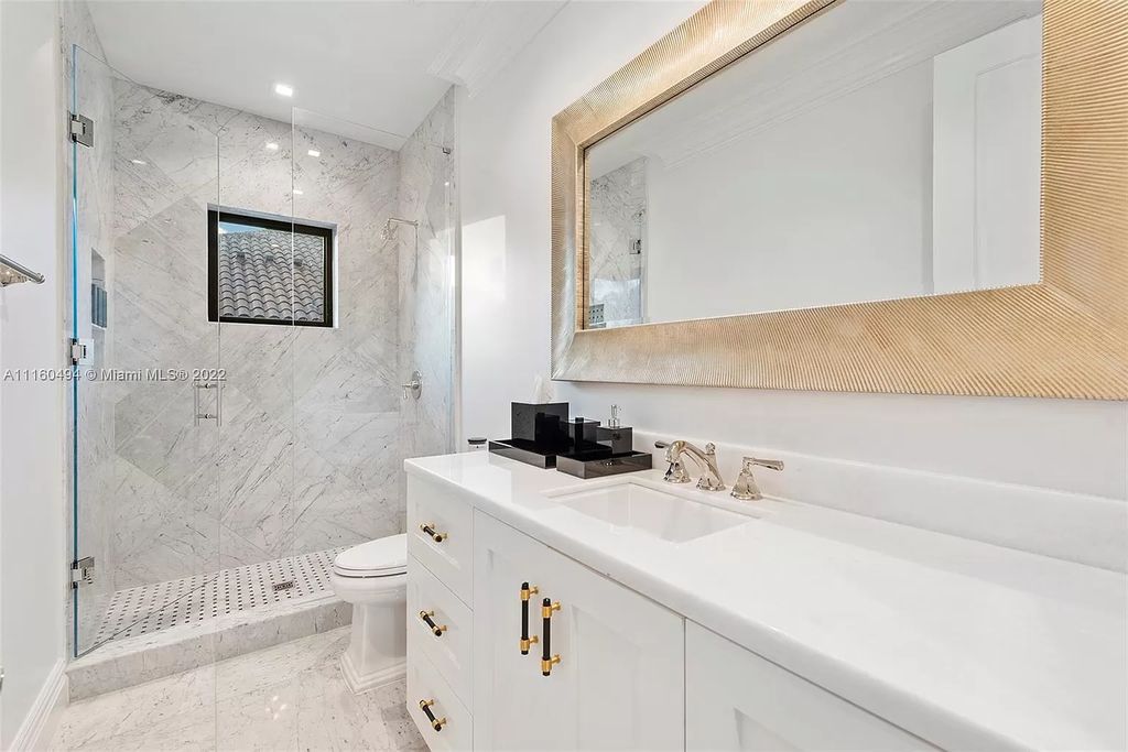 The Mansion in Fort Lauderdale is a timelessly designed home featuring a grand double height entryway and a thoughtful floorplan now available for sale. This home located at 2436 Aqua Vista Blvd, Fort Lauderdale, Florida
