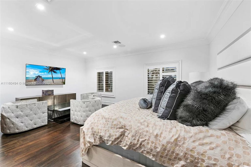 The Mansion in Fort Lauderdale is a timelessly designed home featuring a grand double height entryway and a thoughtful floorplan now available for sale. This home located at 2436 Aqua Vista Blvd, Fort Lauderdale, Florida