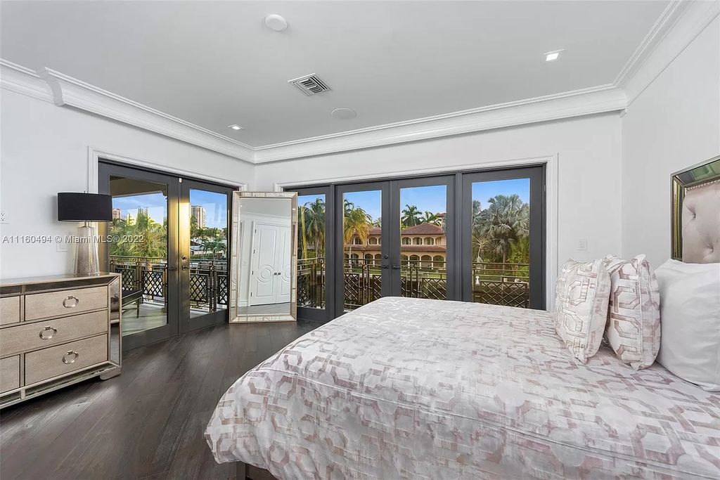 The Mansion in Fort Lauderdale is a timelessly designed home featuring a grand double height entryway and a thoughtful floorplan now available for sale. This home located at 2436 Aqua Vista Blvd, Fort Lauderdale, Florida