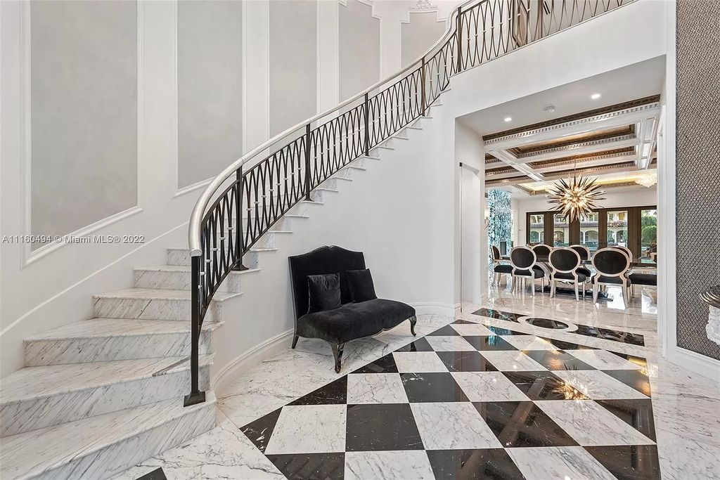The Mansion in Fort Lauderdale is a timelessly designed home featuring a grand double height entryway and a thoughtful floorplan now available for sale. This home located at 2436 Aqua Vista Blvd, Fort Lauderdale, Florida