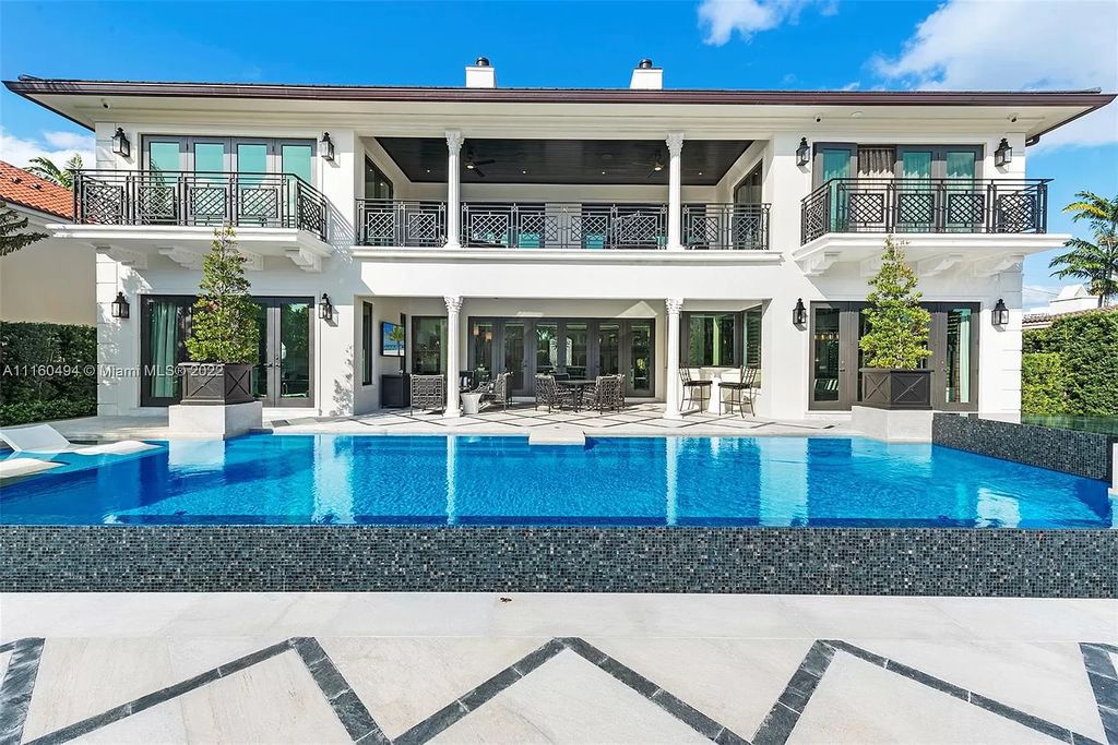 The Mansion in Fort Lauderdale is a timelessly designed home featuring a grand double height entryway and a thoughtful floorplan now available for sale. This home located at 2436 Aqua Vista Blvd, Fort Lauderdale, Florida