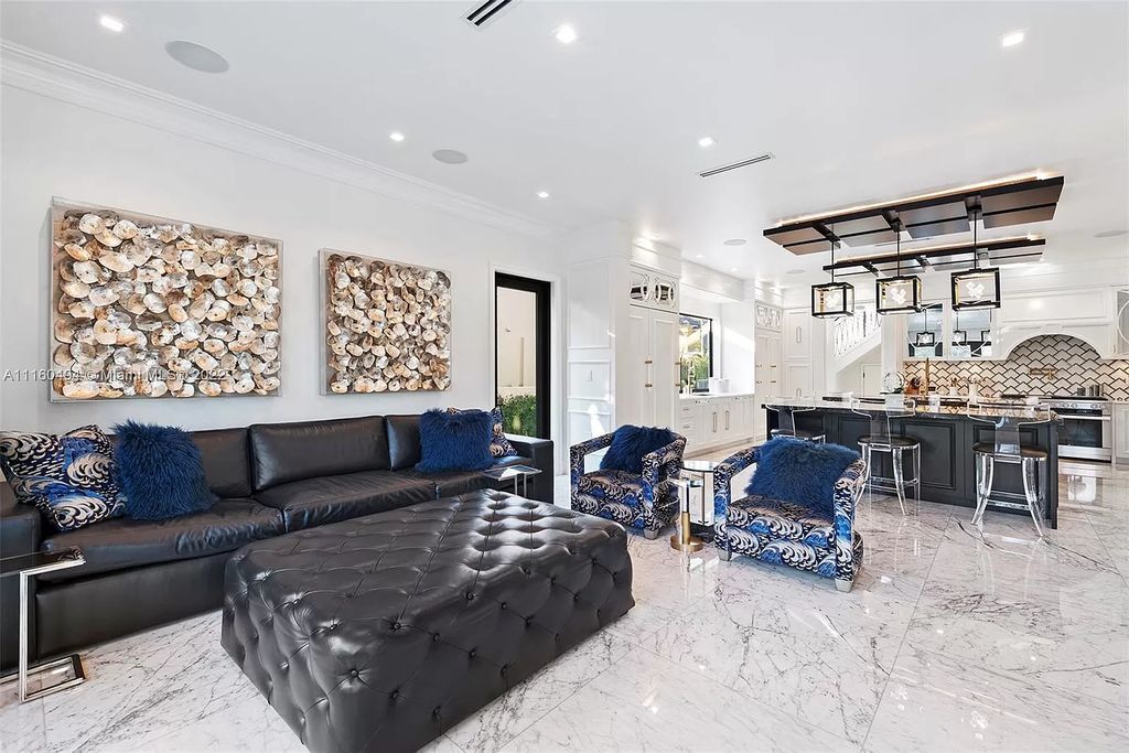 The Mansion in Fort Lauderdale is a timelessly designed home featuring a grand double height entryway and a thoughtful floorplan now available for sale. This home located at 2436 Aqua Vista Blvd, Fort Lauderdale, Florida