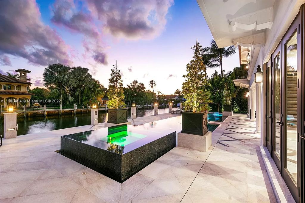 The Mansion in Fort Lauderdale is a timelessly designed home featuring a grand double height entryway and a thoughtful floorplan now available for sale. This home located at 2436 Aqua Vista Blvd, Fort Lauderdale, Florida