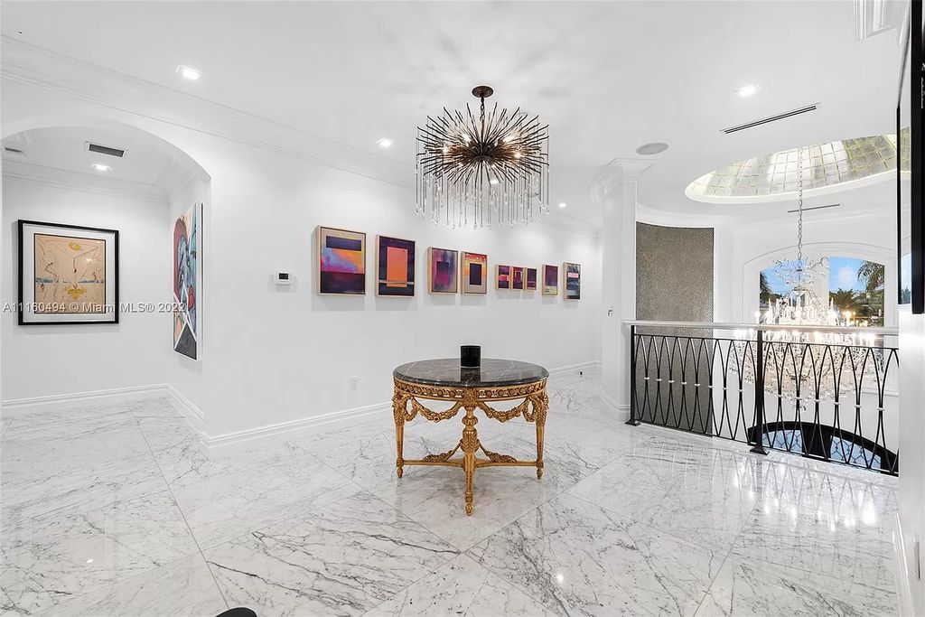 The Mansion in Fort Lauderdale is a timelessly designed home featuring a grand double height entryway and a thoughtful floorplan now available for sale. This home located at 2436 Aqua Vista Blvd, Fort Lauderdale, Florida