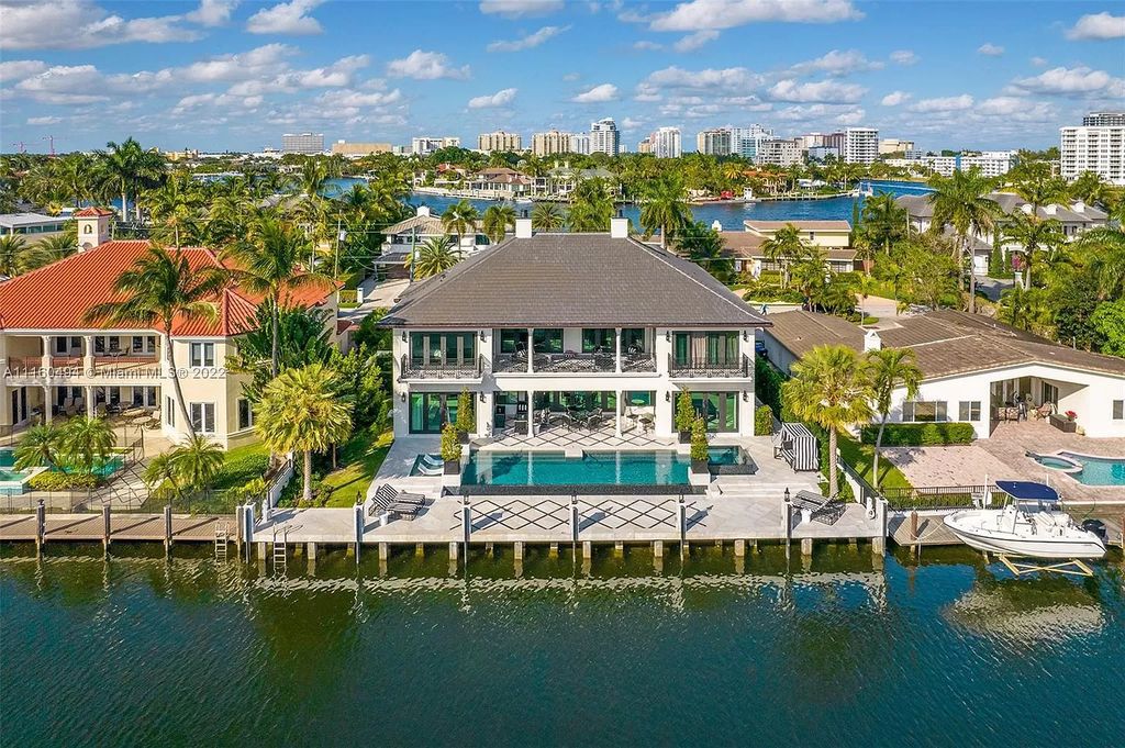 The Mansion in Fort Lauderdale is a timelessly designed home featuring a grand double height entryway and a thoughtful floorplan now available for sale. This home located at 2436 Aqua Vista Blvd, Fort Lauderdale, Florida