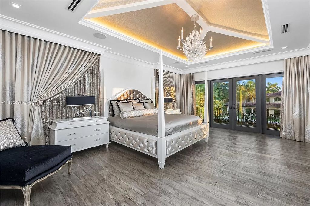 The Mansion in Fort Lauderdale is a timelessly designed home featuring a grand double height entryway and a thoughtful floorplan now available for sale. This home located at 2436 Aqua Vista Blvd, Fort Lauderdale, Florida