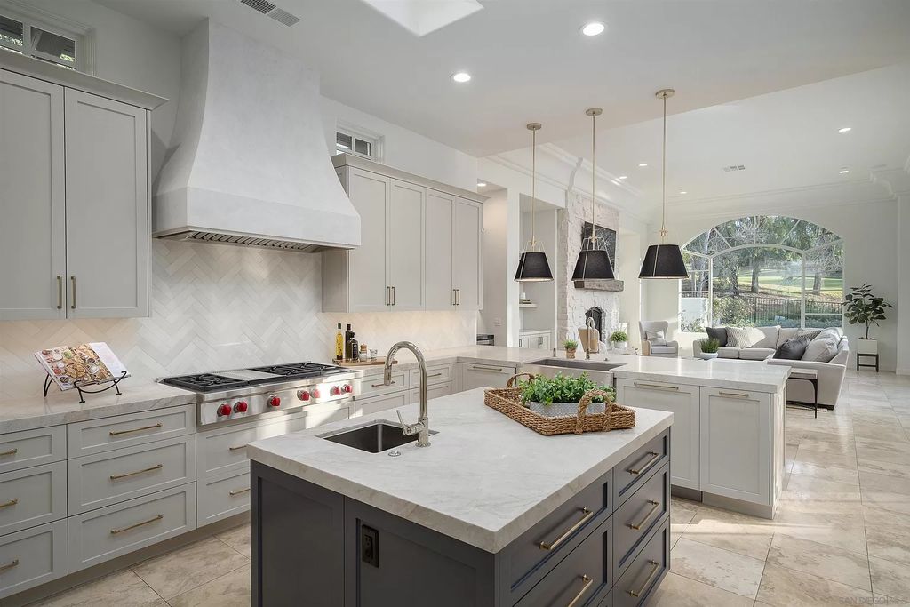 The Home in Rancho Santa Fe is a classically remodeled home with southern views overlooks golf course open space now available for sale. This home located at 6641 Calle Ponte Bella, Rancho Santa Fe, California