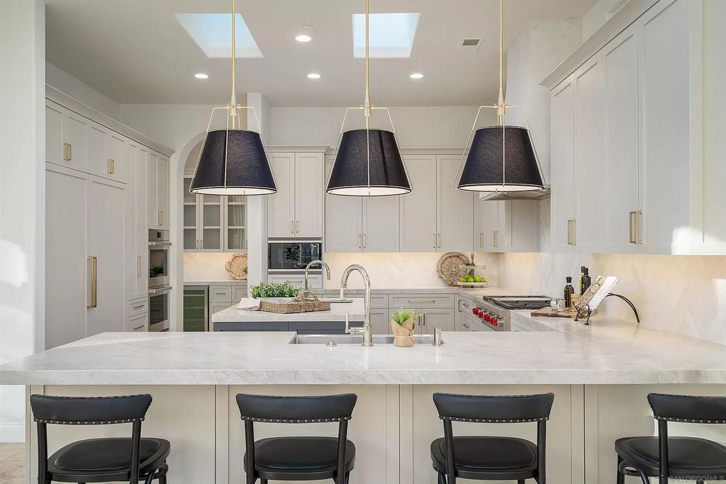 The Home in Rancho Santa Fe is a classically remodeled home with southern views overlooks golf course open space now available for sale. This home located at 6641 Calle Ponte Bella, Rancho Santa Fe, California