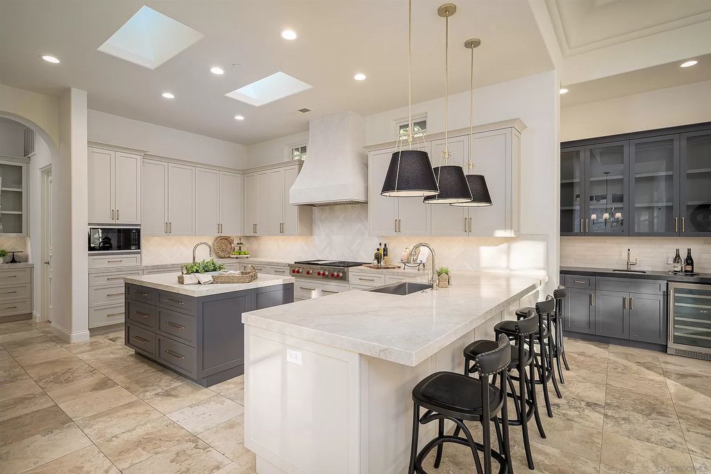 The Home in Rancho Santa Fe is a classically remodeled home with southern views overlooks golf course open space now available for sale. This home located at 6641 Calle Ponte Bella, Rancho Santa Fe, California