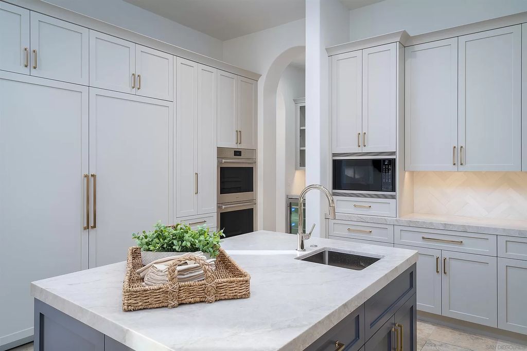 The Home in Rancho Santa Fe is a classically remodeled home with southern views overlooks golf course open space now available for sale. This home located at 6641 Calle Ponte Bella, Rancho Santa Fe, California