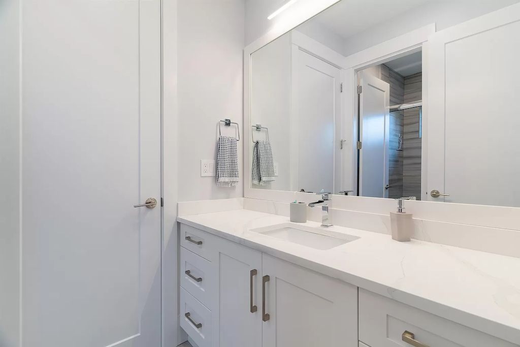 The Home in Delta is a brand-new custom built modern home radiant heat flooring, control 4 automation, motorized blinds, and much more, now available for sale