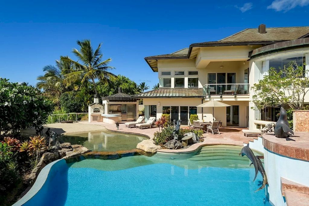 The Home in Hawaii is a luxurious home fully equipped with high-end amenities as well as commanding panoramic ocean views now available for sale.