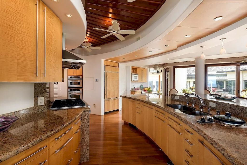 The Home in Hawaii is a luxurious home fully equipped with high-end amenities as well as commanding panoramic ocean views now available for sale.