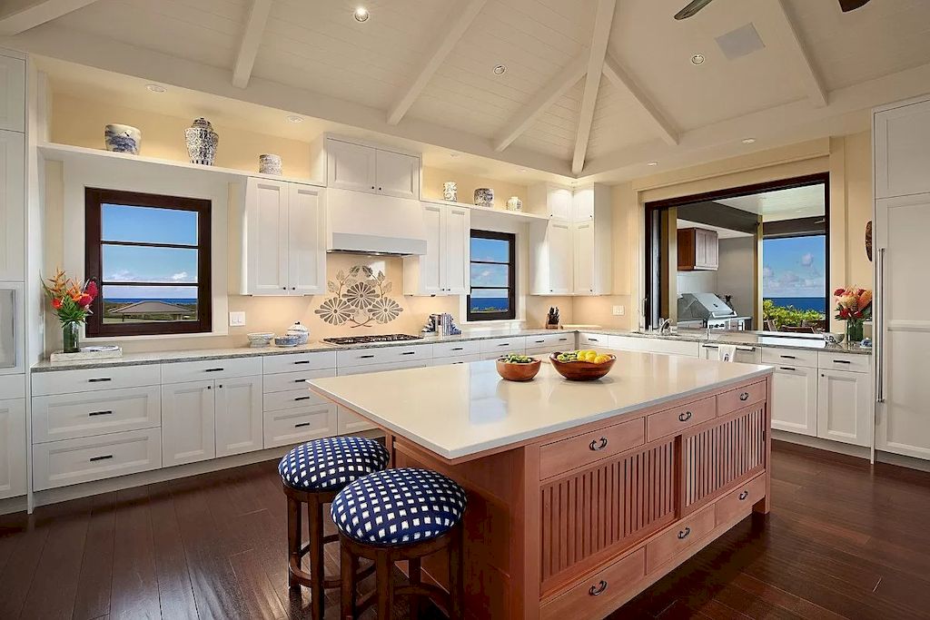 The Home in Hawaii is a luxurious home displaying unparalleled ocean, mountain, and coastal vistas now available for sale. This home located at 3027 Kalahiki St, Koloa, Hawaii; offering 04 bedrooms and 05 bathrooms with 4,490 square feet of living spaces.