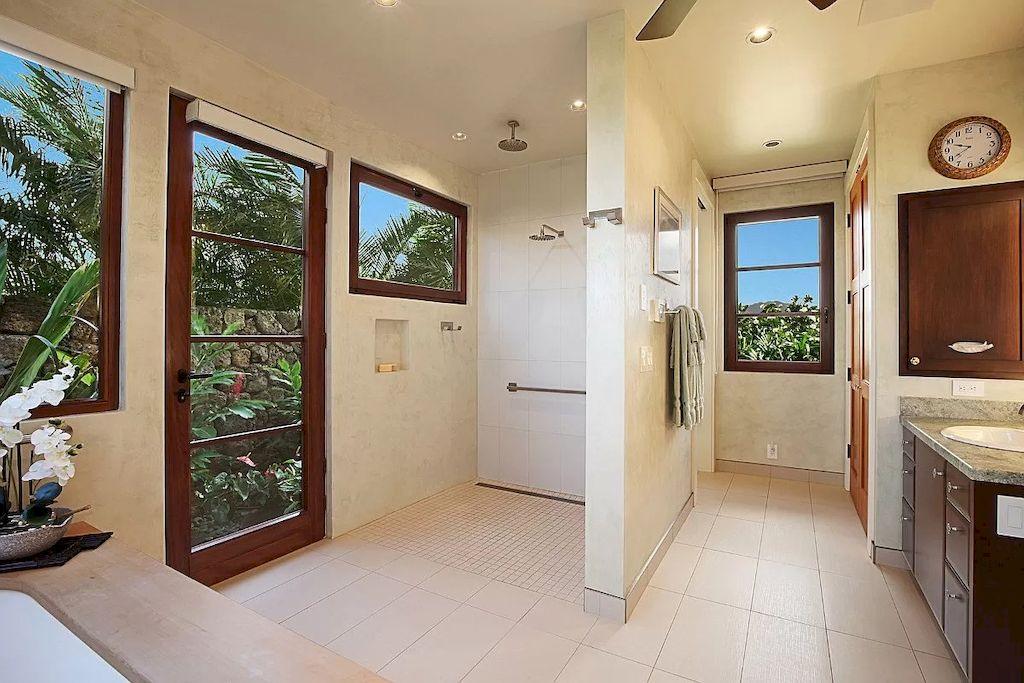 The Home in Hawaii is a luxurious home displaying unparalleled ocean, mountain, and coastal vistas now available for sale. This home located at 3027 Kalahiki St, Koloa, Hawaii; offering 04 bedrooms and 05 bathrooms with 4,490 square feet of living spaces.