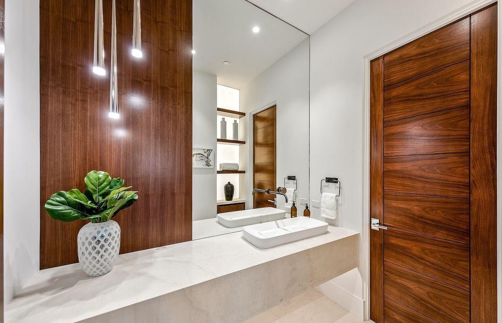 The Home in Rancho Santa Fe is an exquisite luxury oasis conceived by top team builder & design visionaries offering incomparable unobstructed views now available for sale. This house located at 18080 Via De Fortuna, Rancho Santa Fe, California