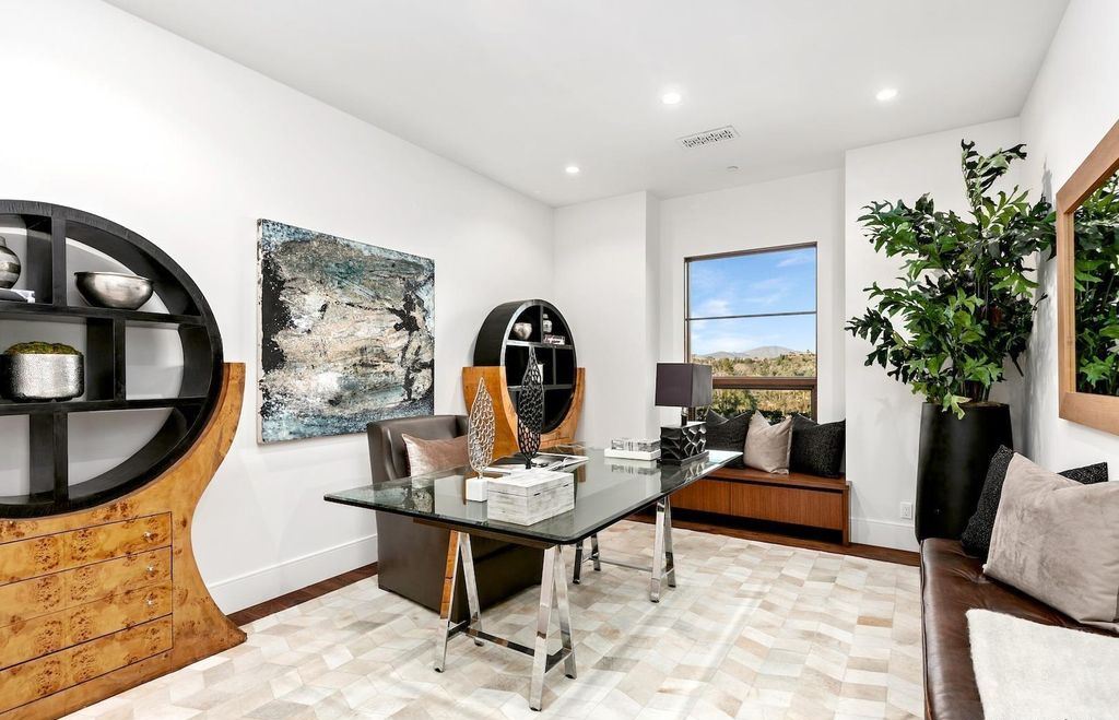 The Home in Rancho Santa Fe is an exquisite luxury oasis conceived by top team builder & design visionaries offering incomparable unobstructed views now available for sale. This house located at 18080 Via De Fortuna, Rancho Santa Fe, California
